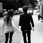 couple-in-town-walking-holding-hands-street-holding-hands-1855011888